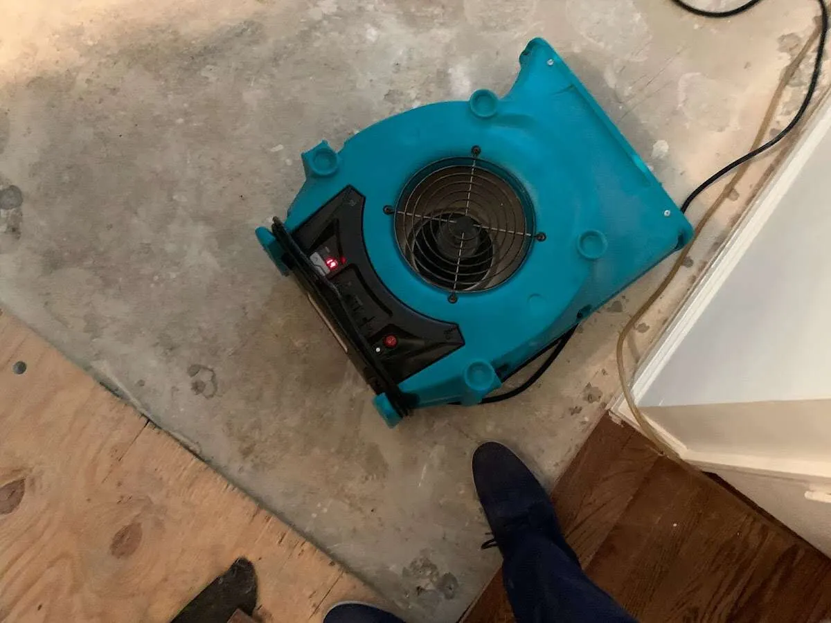Air mover drying subfloor during Leak Detection & Repair in Choctaw