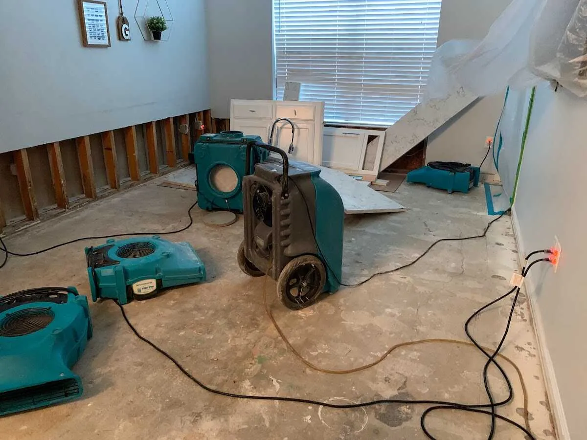 Dehumidifier in flood-cut room for Water Damage Restoration in Choctaw